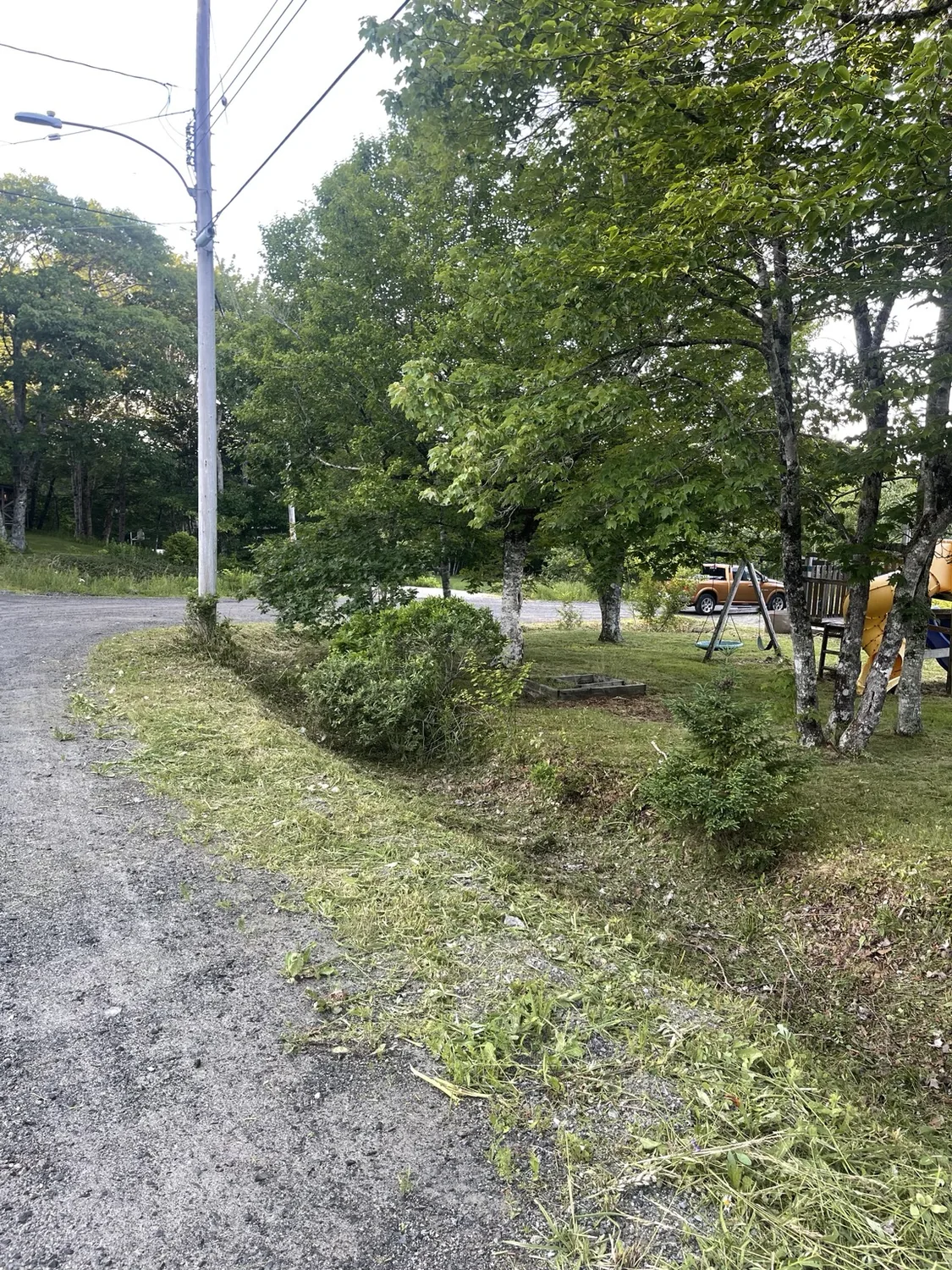 After: roadside edge cut and cleared